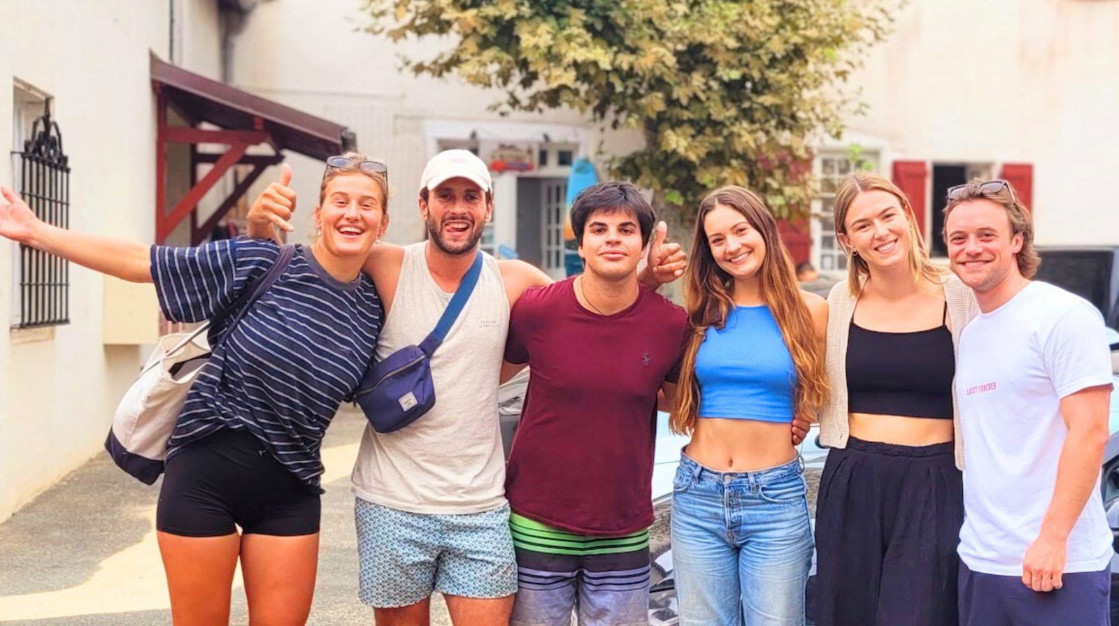 Guests Posing In Front Of surf Hostel biarritz